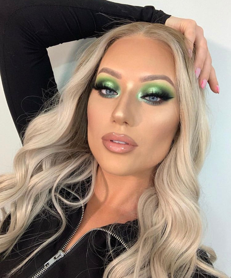 Model wearing blonde balayage 17-inch HD lace human hair wig in body wave texture – Nuola Wigs.