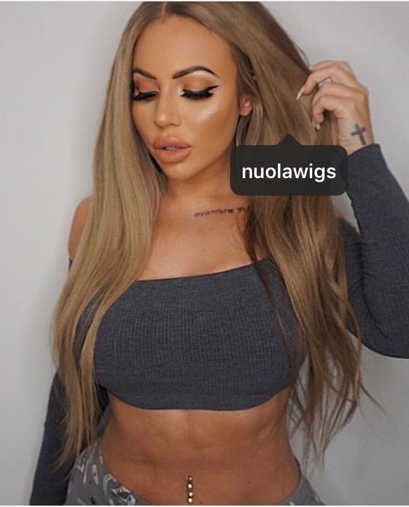 Model wearing blonde balayage 22-inch HD lace human hair wig in body wave texture – Nuola Wigs.