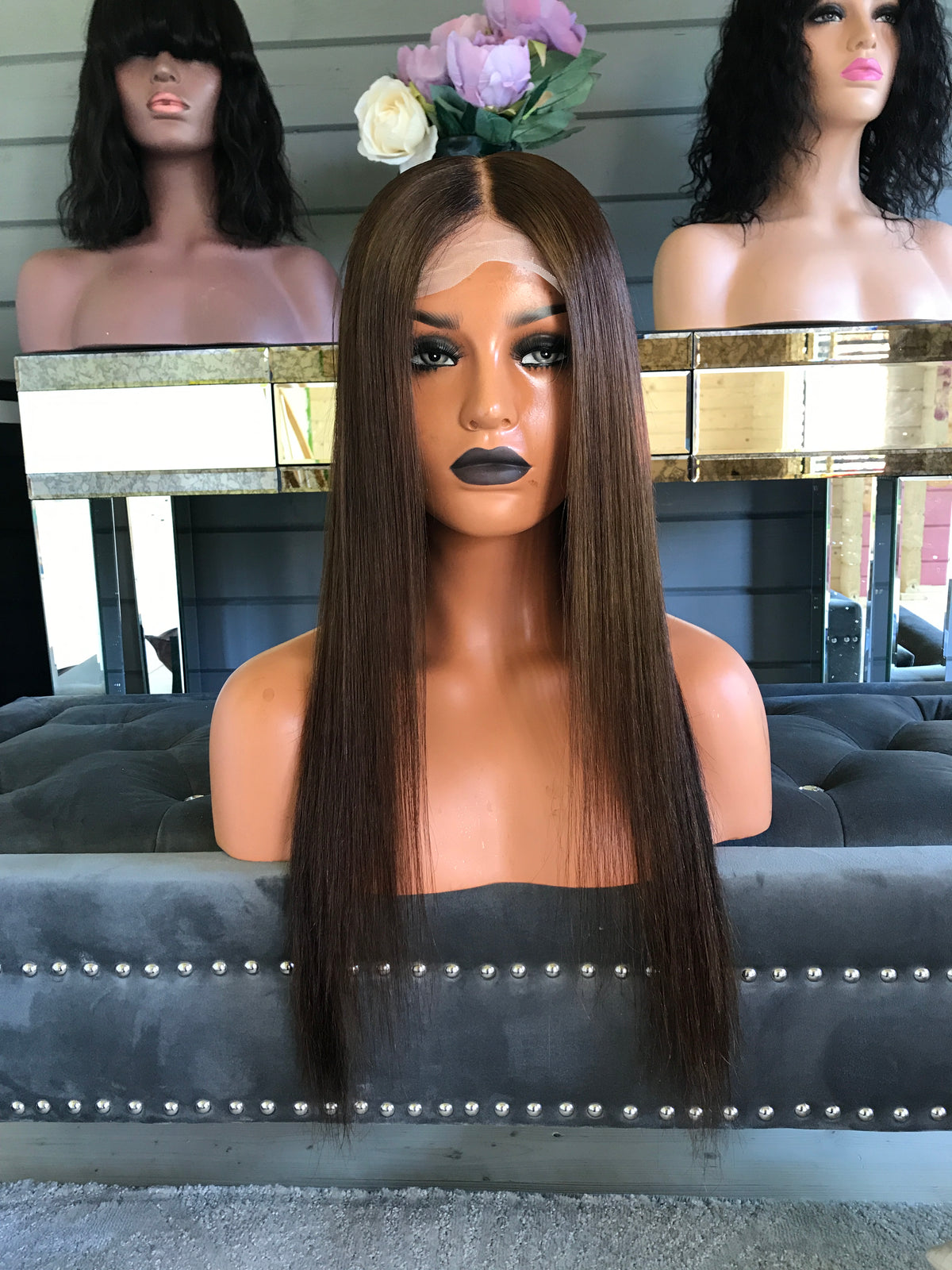 Model wearing brown balayage 20-inch HD lace human hair wig in body wave
texture – Nuola Wigs.