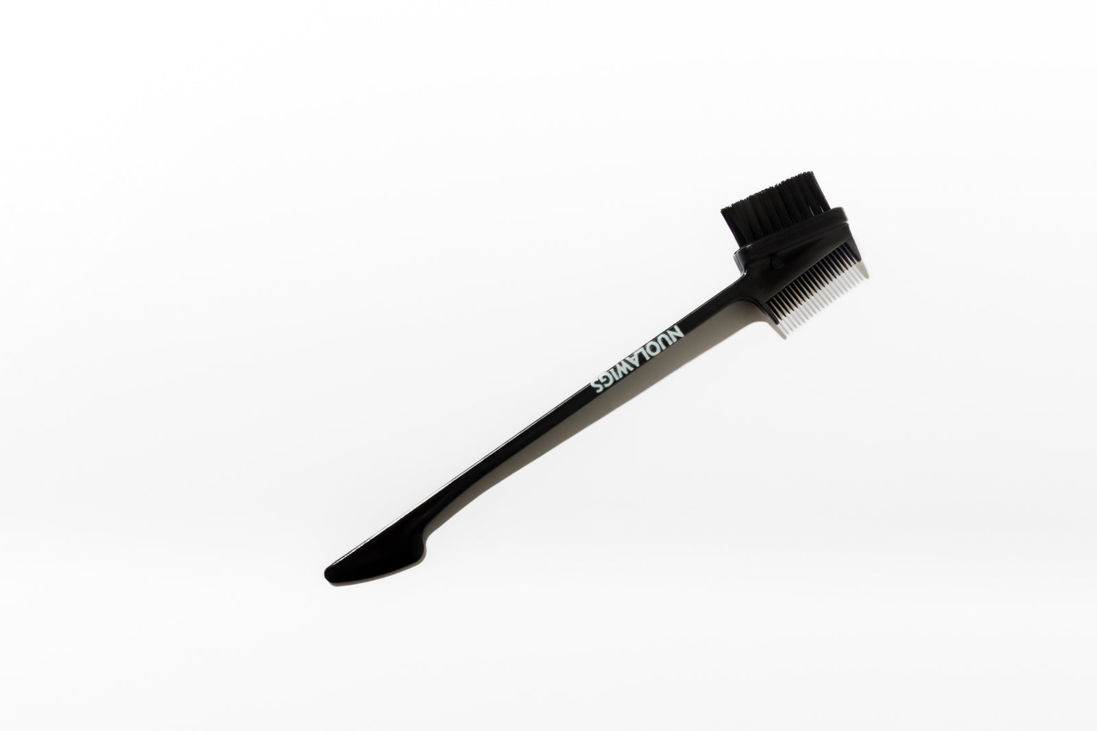 Small multi brush for wig styling, edge smoothing and precision finishing – Nuola Wigs.