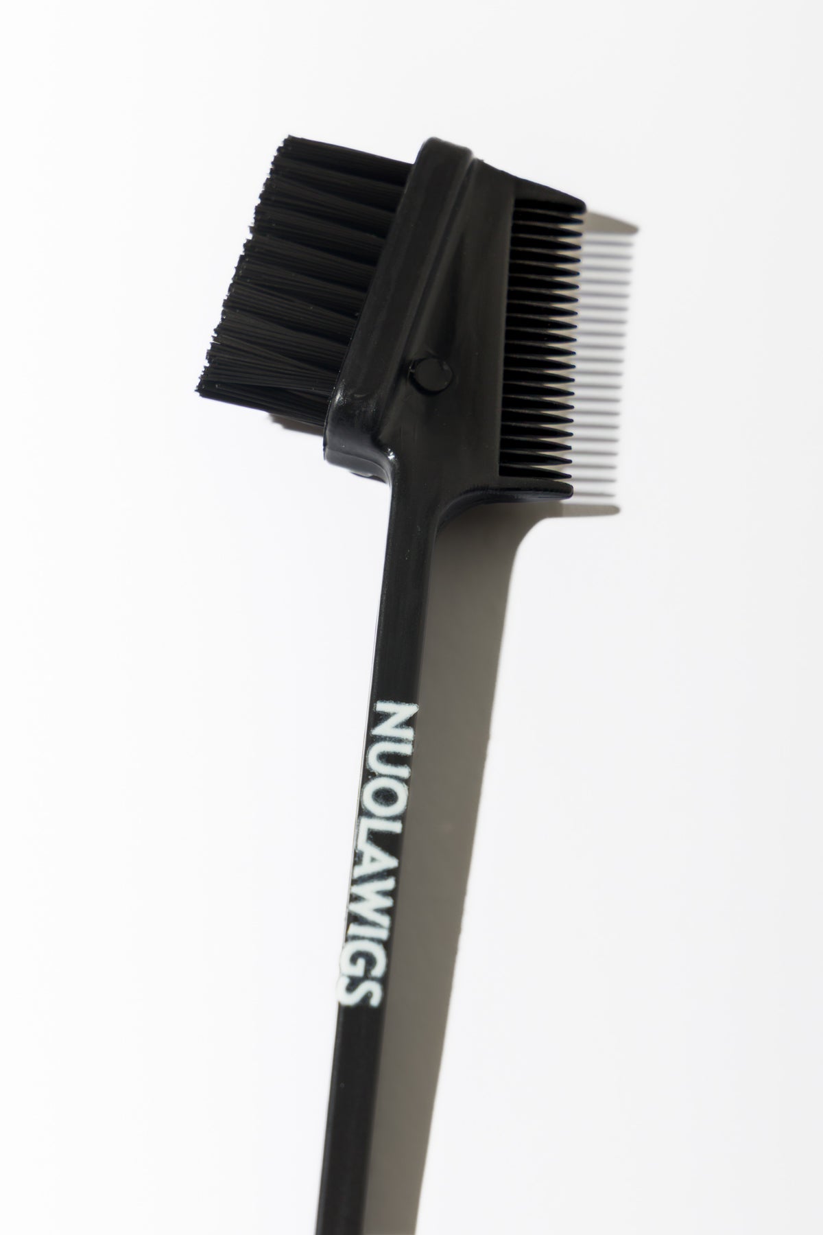 Small multi brush for wig styling, edge smoothing and precision finishing – Nuola Wigs.